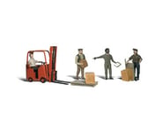 more-results: A scene of four men working: one is carrying a crate, one is using a dolly to move a l